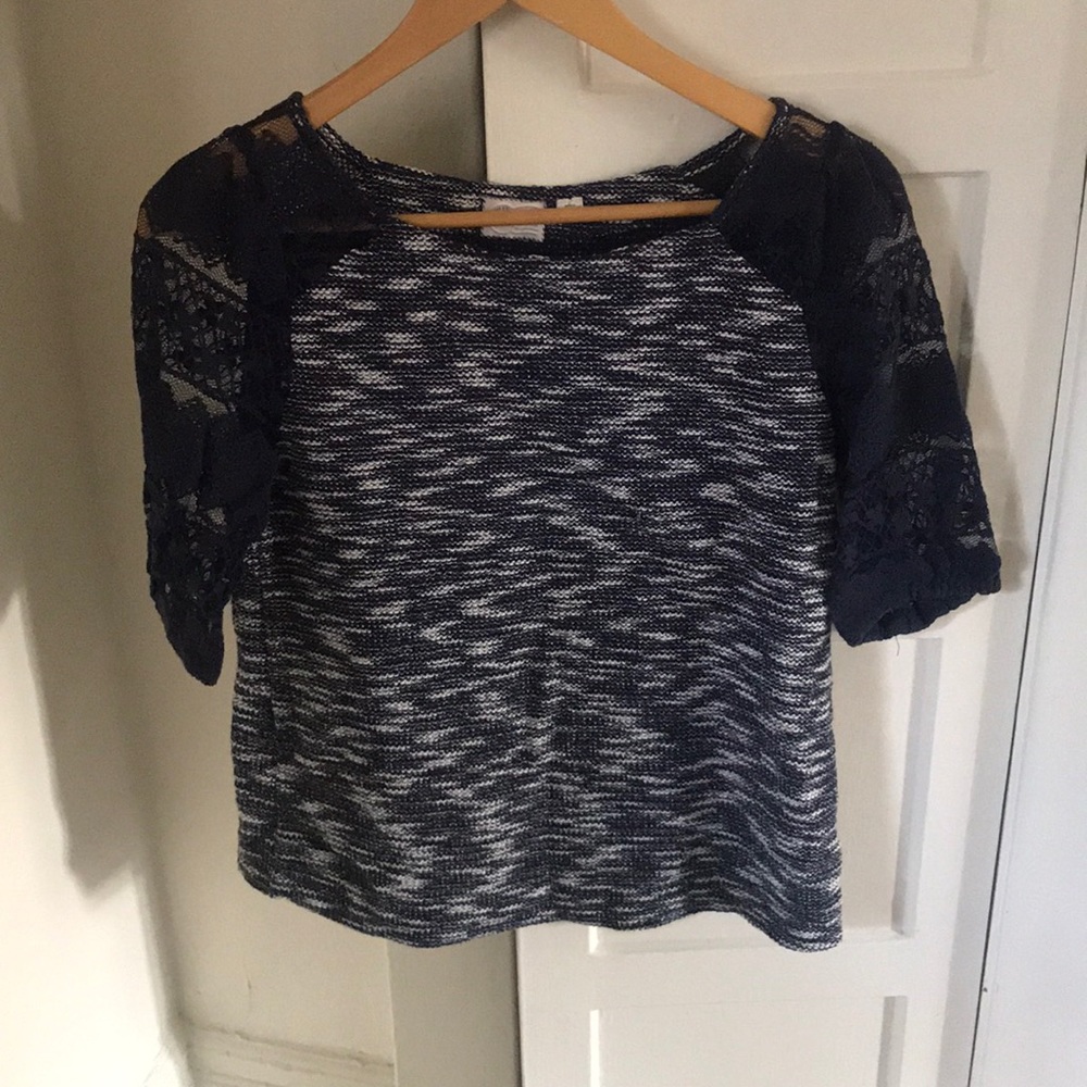 Blue three quarter length sleeved shirt